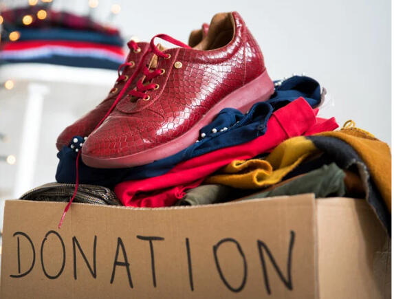 the-iconic-image-in-person-wardrobe-reclamation-donation.jpg Shoes and clothing prepared for donation during an In-Person Wardrobe Reclamation session.